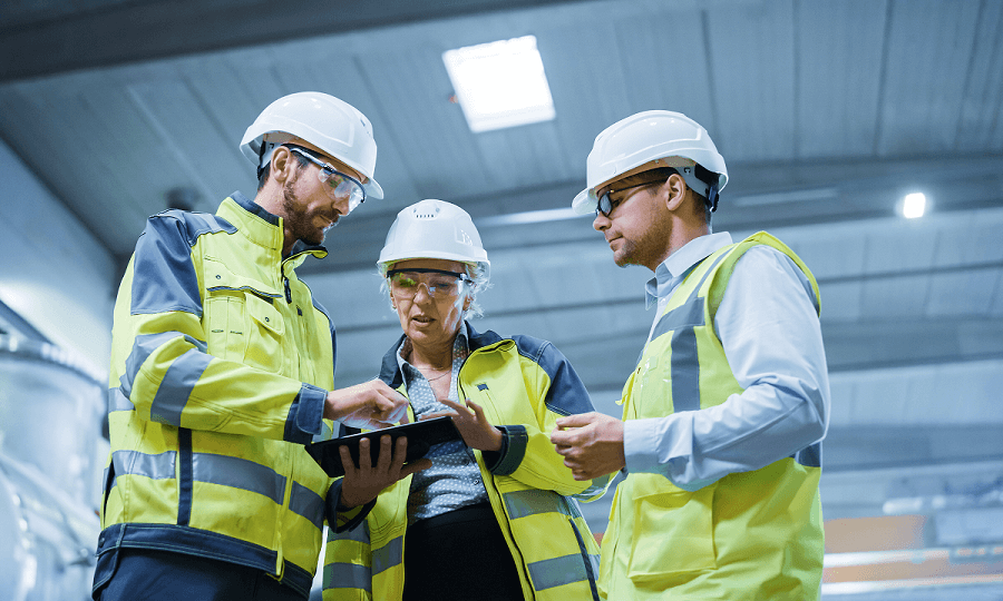 Workers using Electrical Preventive Maintenance Software